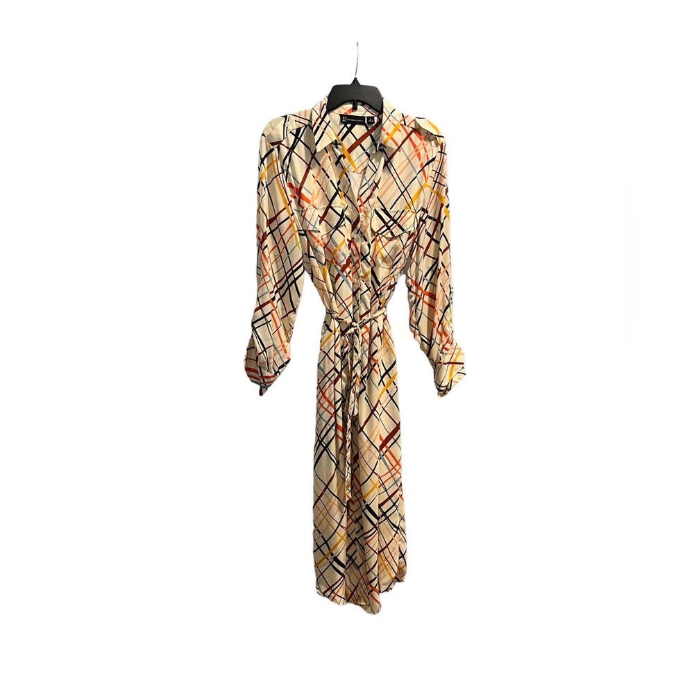 Brand new button shirt dress w/ long sleeves and a tie belt.